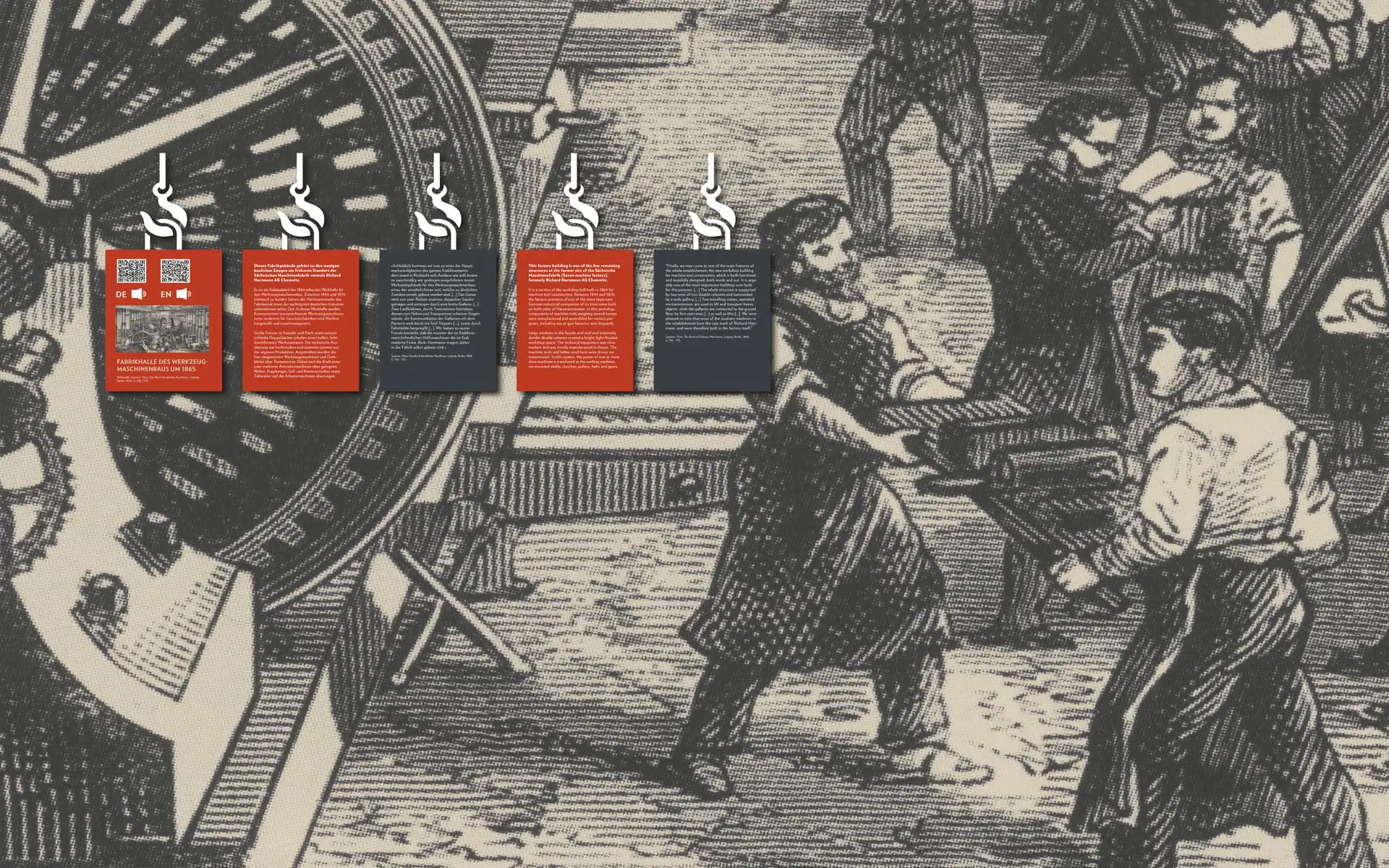 Historische Druckgrafik mit erklärenden Hängeelementen in Rot und Anthrazit.