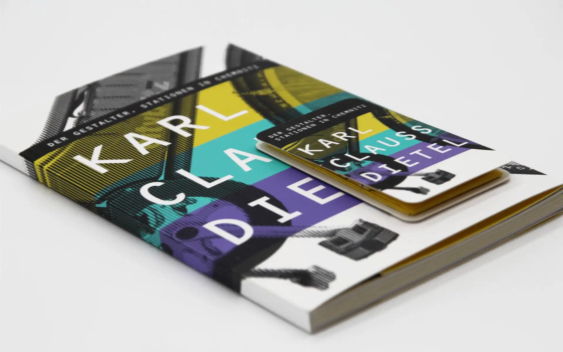 Buchtitel 'Karl Claus Dietel' auf farbig segmentiertem Cover, fotografische Elemente und große weiße Typografie.